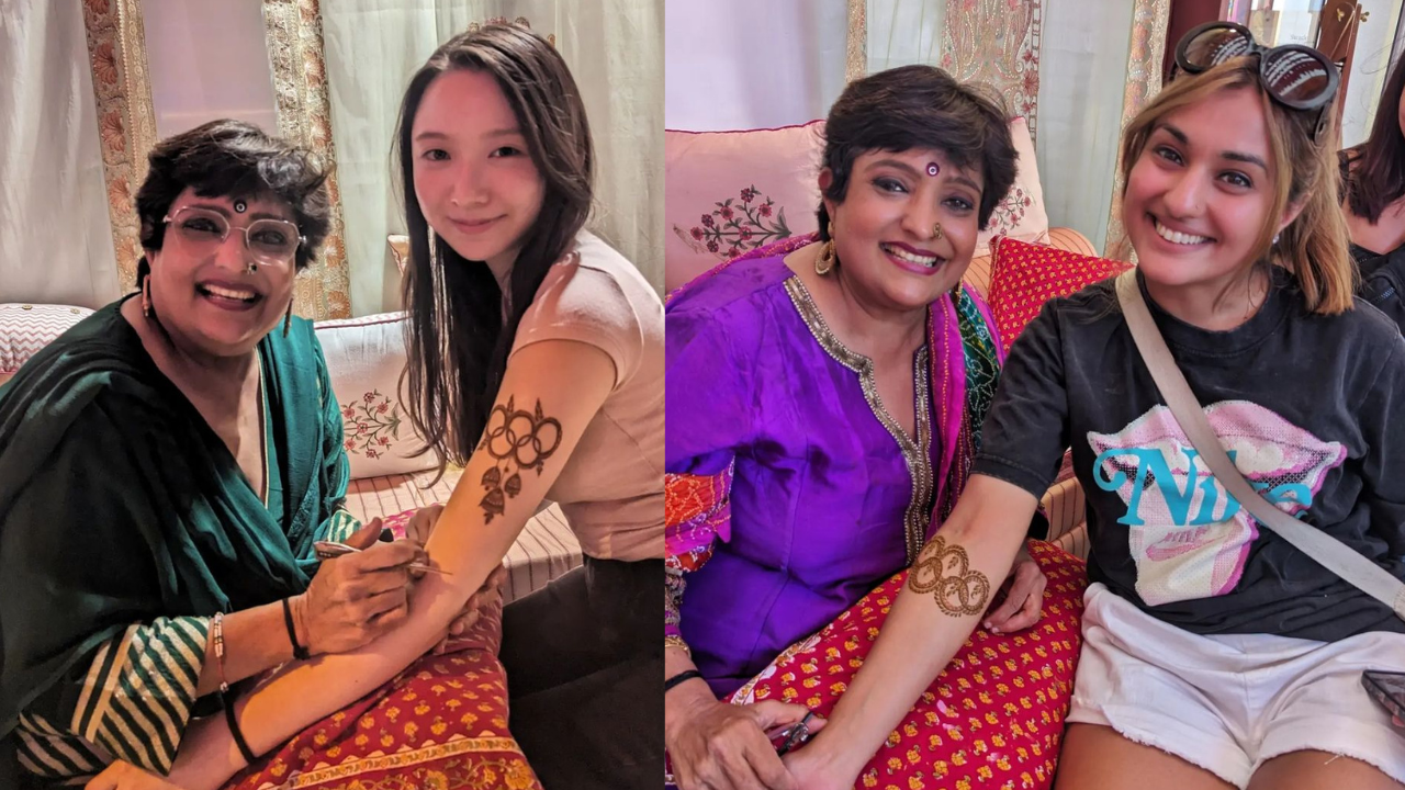 Veena Nagda applies mehendi to fans in Paris at the Olympics