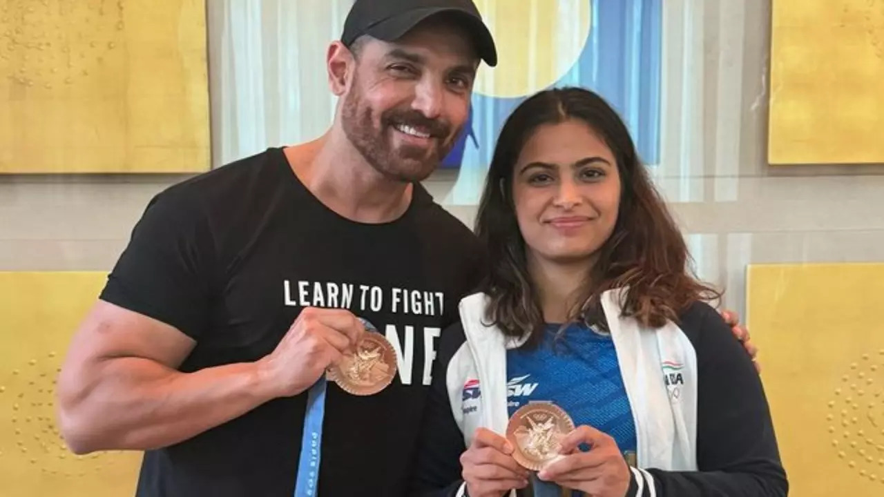 John Abraham Draws Flak For Viral Pics With Manu Bhaker. Netizens Say 'Shouldn't Have Held Olympics Medal'