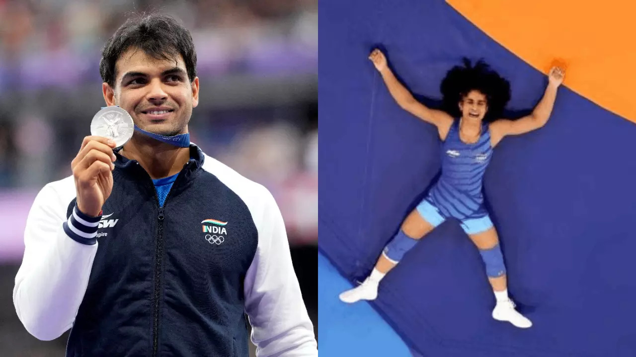 neeraj chopra vinesh phogat AP PTI