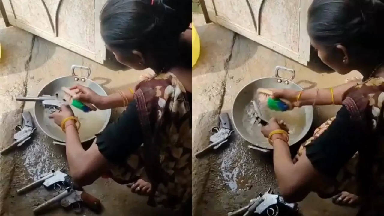 A woman washes pistols at an illegal gun factory in Morena, Madhya Pradesh. | Credit: Mahua Police