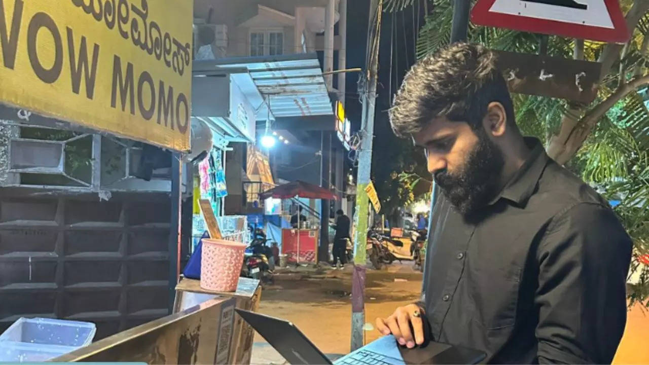 Bengaluru Techie Works On Laptop Outside Momo Stall