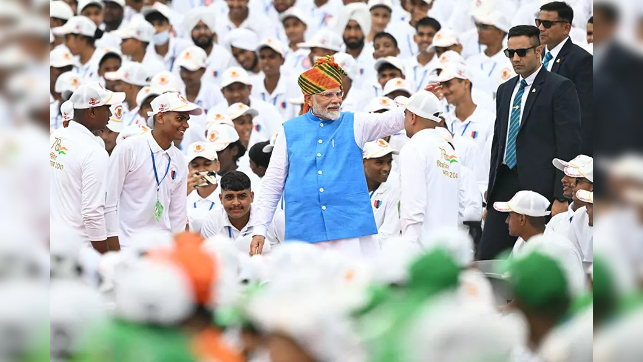 Prime Minister Narendra Modi meets school children to mark India's Independence Day at the Red Fort in New Delhi on August 15, 2024.