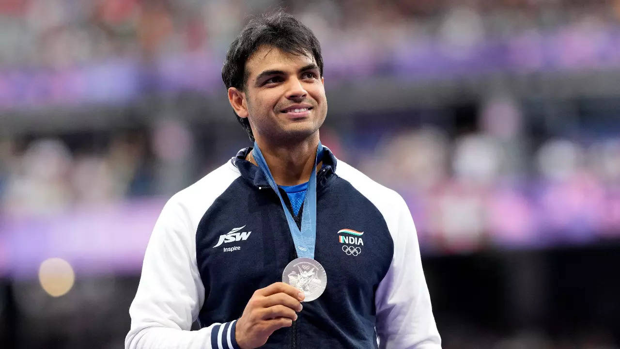 Neeraj Chopra with his silver medal at Paris Olympics