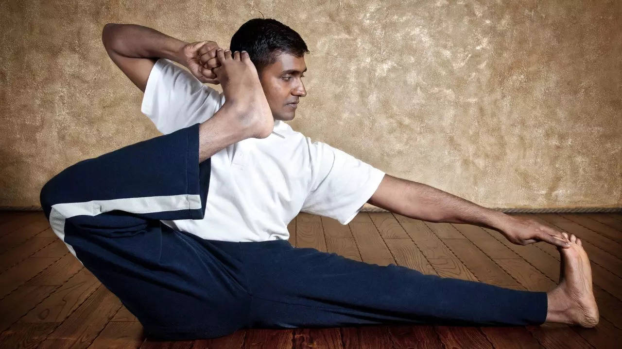 Health Benefits Of ​Akarna Dhanurasana And How To Do It​