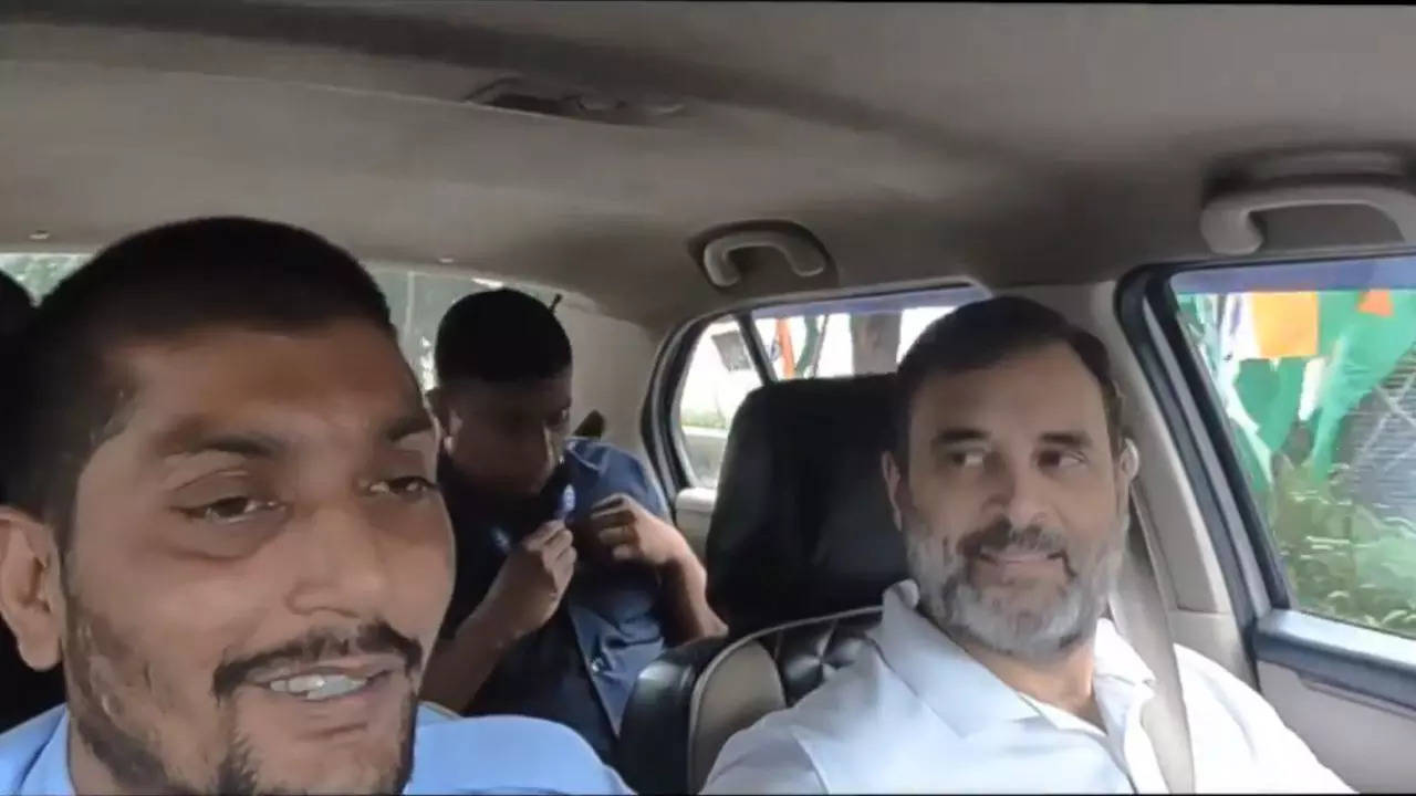 Rahul Gandhi with Uber cab driver Sunil Upadhyay