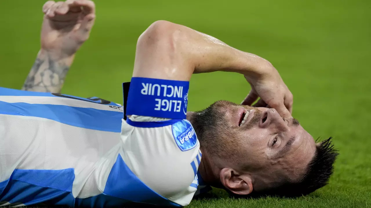 Lionel Messi crying in pain during a Copa America match