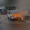 Hyderabad Moving Car Catches Fire on Phisal Banda Road Couple Escapes - Video