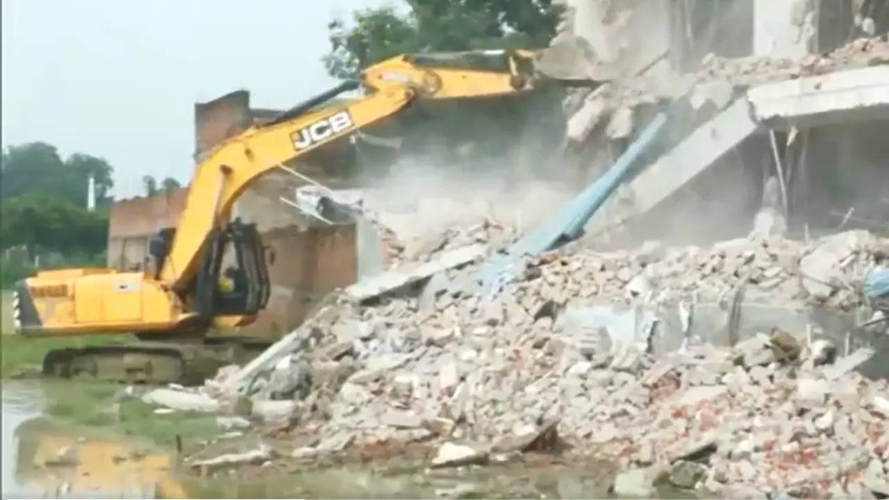 Bulldozer action at illegal shopping complex belonging to Ayodhya gangrape accused