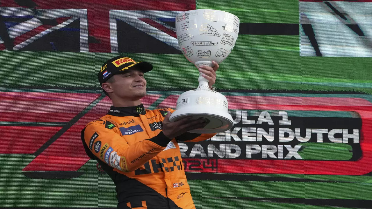 Lando Norris with the winners trophy at the Dutch GP