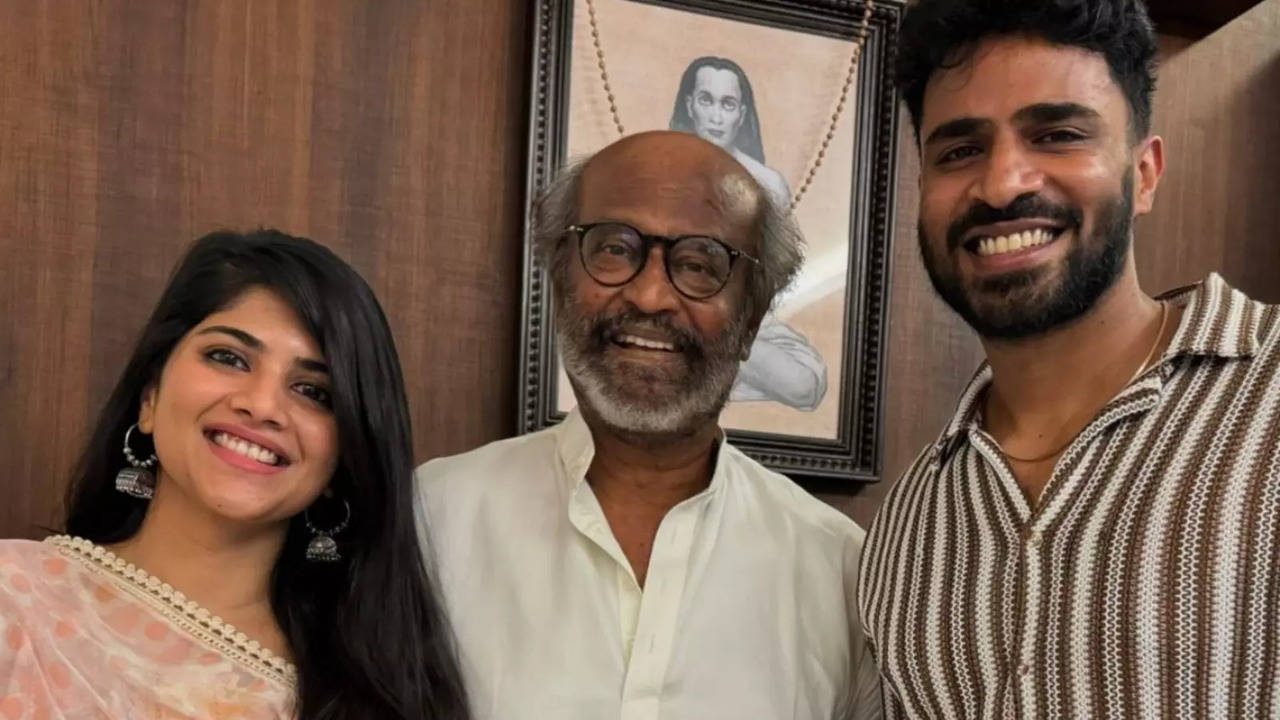 Megha Akash poses with Rajinikanth