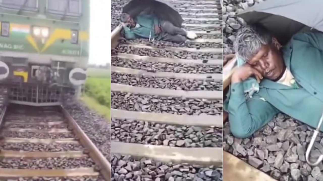 Man Sleeping On Railway Track