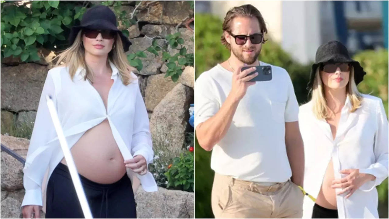 margot robbie exude pregnancy glow, vacations with husband tom ackerley in sardinia  see photos