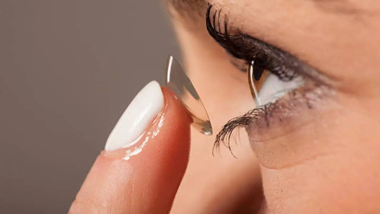 Never shower or swim wearing contact lenses, according to experts