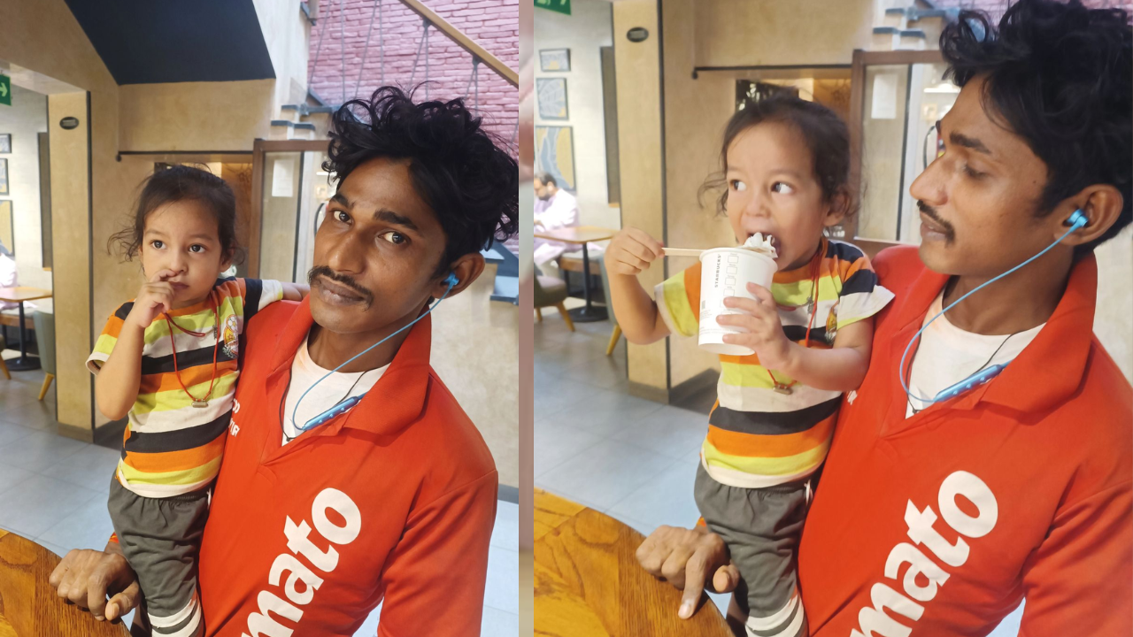 Zomato delivery agent with his two-year-old daughter