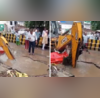 Gurugram Is Not For Beginners Delivery Agent Swims Out After Road Caves In Amid Heavy Rain