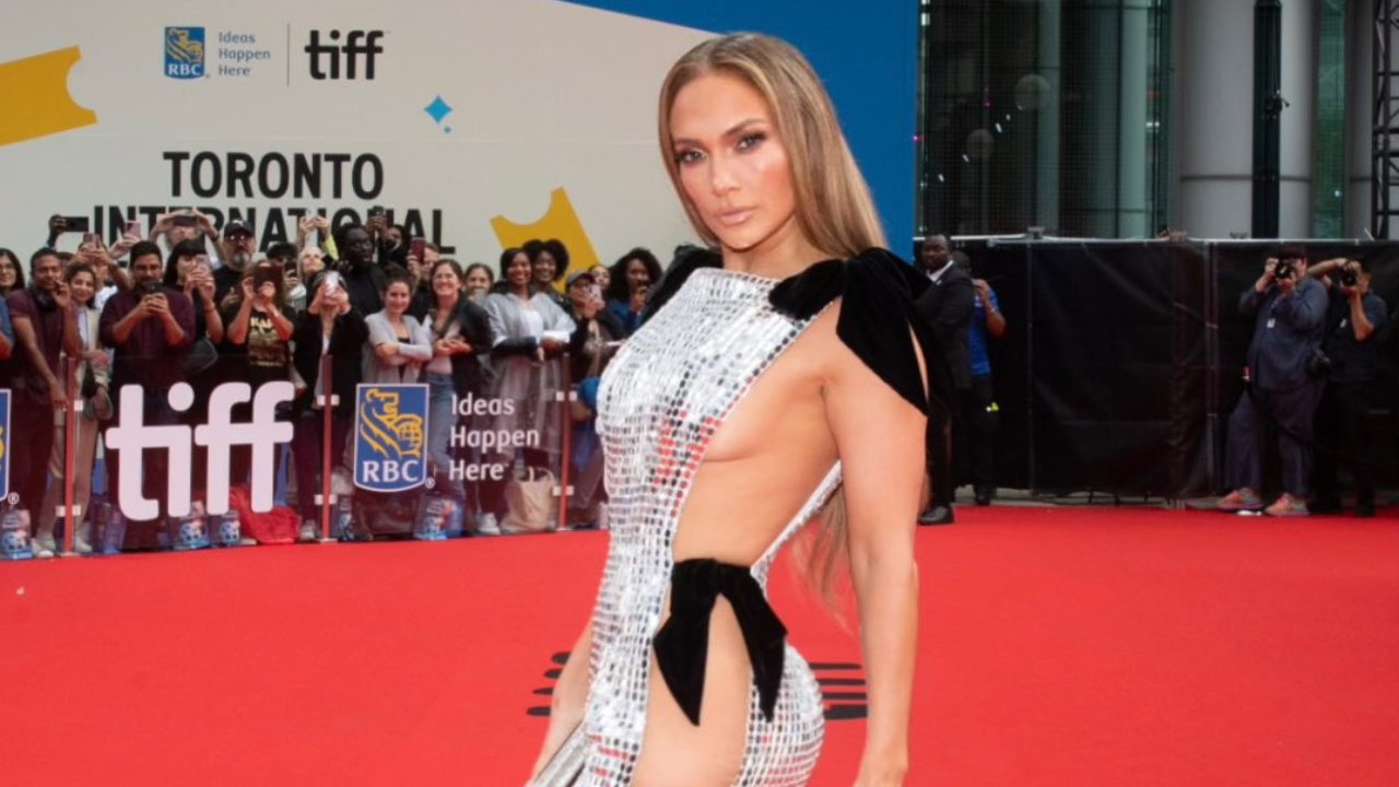 jennifer lopez amps up revenge dressing in sultry silver dress that leaves little to imagination on tiff red carpet