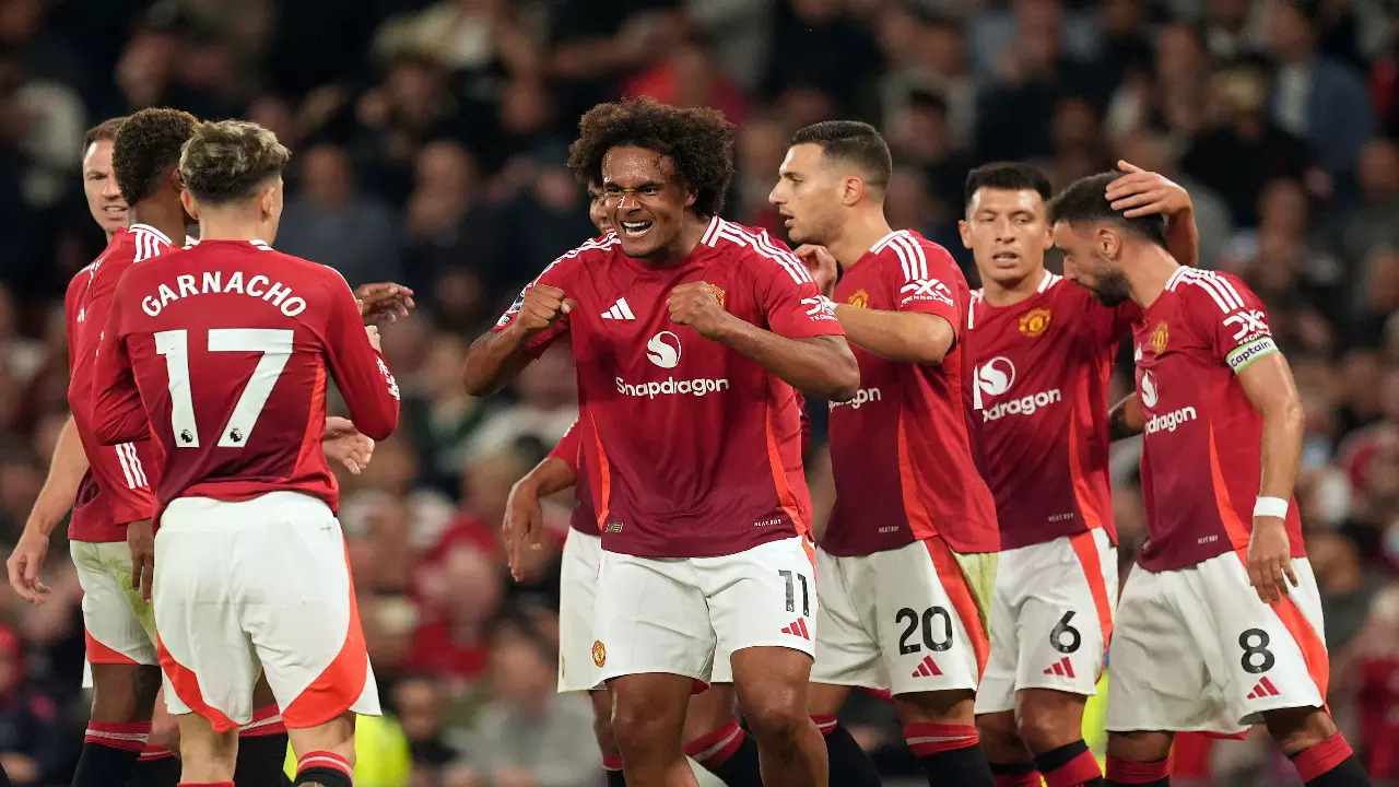 Manchester United players celebrating a goal