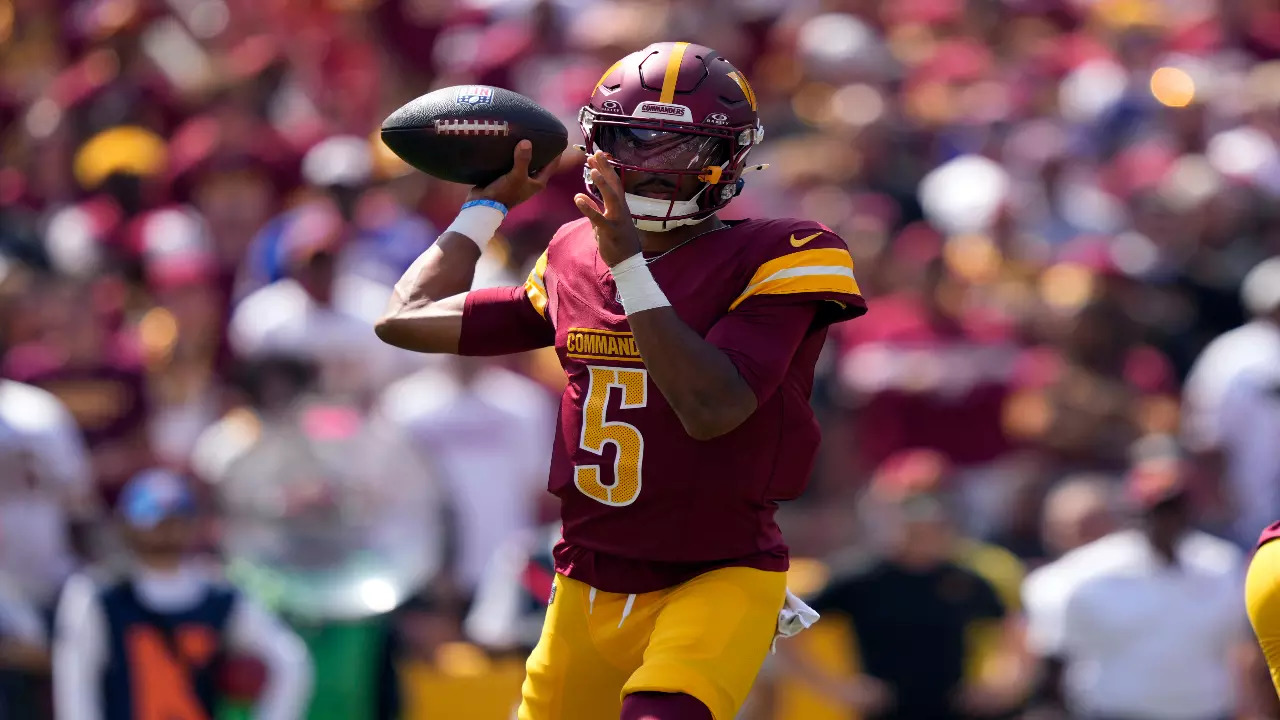 Washington Commanders QB Jayden Daniels in action