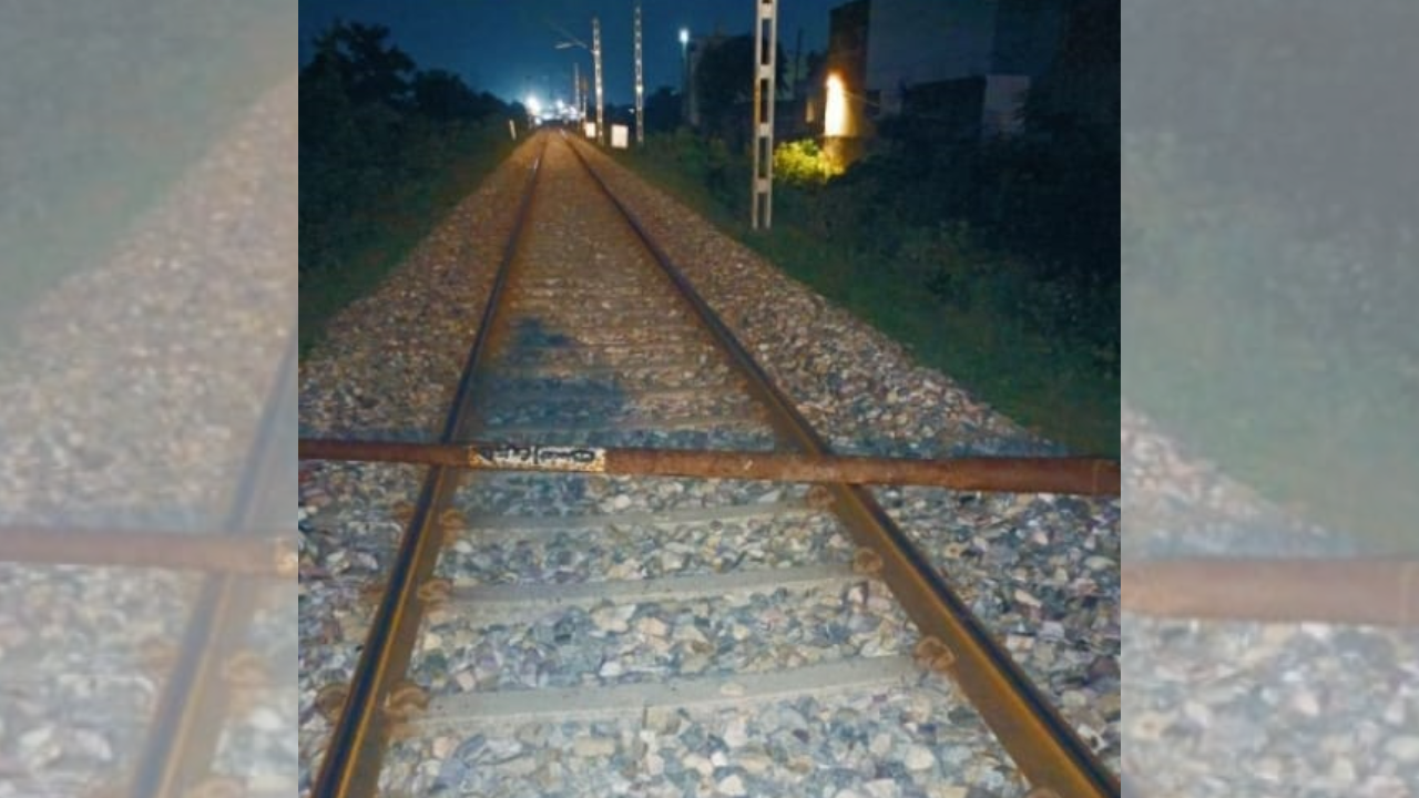 6-meter-rod placed on railway tracks