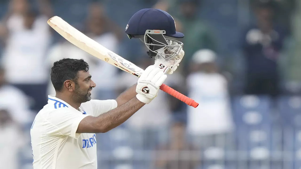 Ravichandran Ashwin acknowledges the crowd after his century