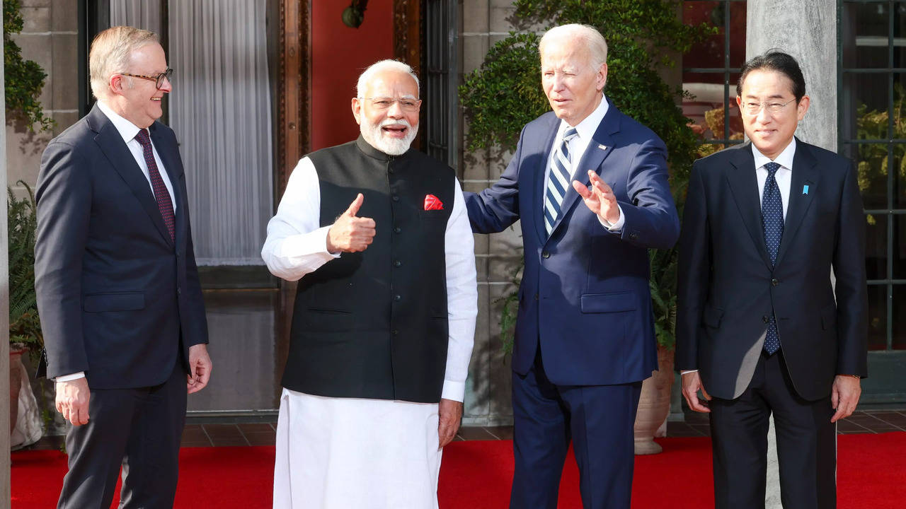 joe biden hand on narendra modi shoulder quad viral video