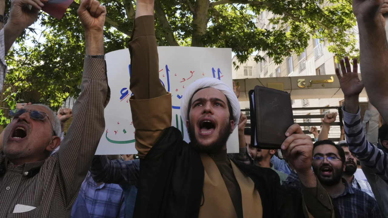 Demonstrators chanting slogans in protest against the burning of Quran in Sweden