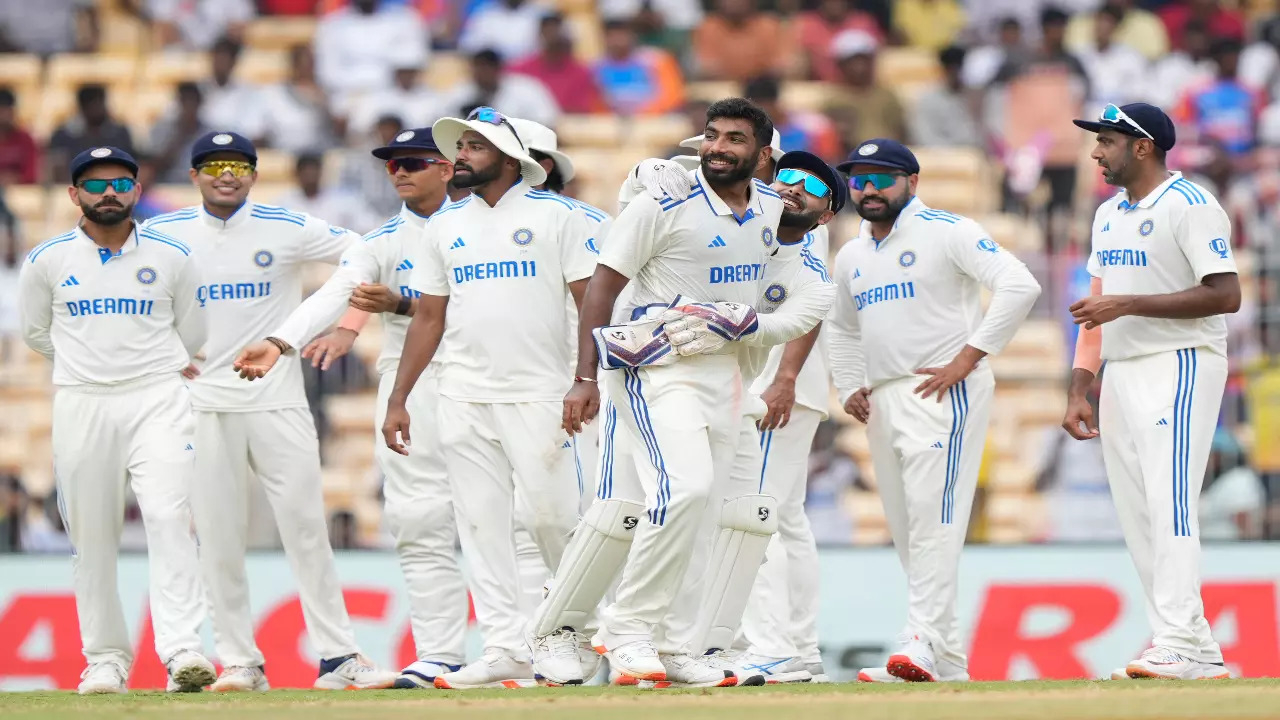 Indian players celebrate a wicket