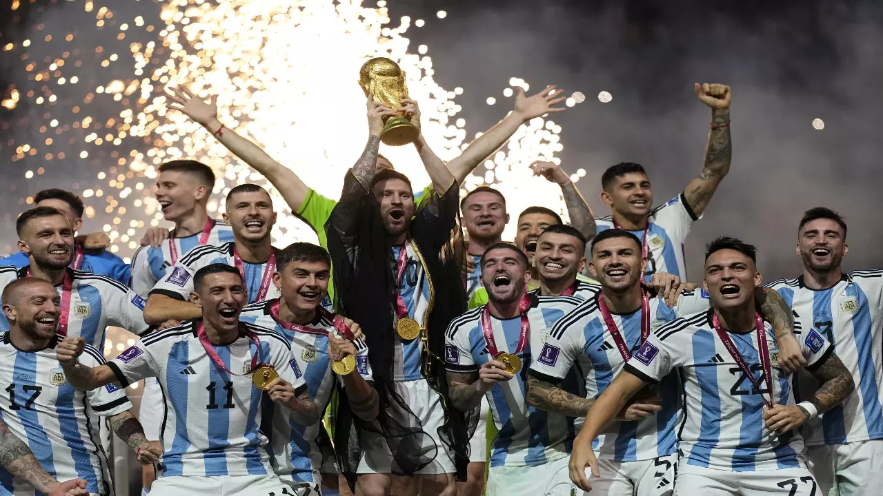 Argentina players lift the FIFA World Cup trophy