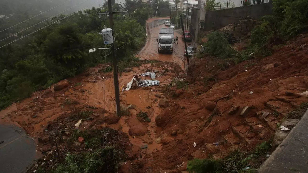 videos surface of massive landslides, flash floods as storm john hits mexico | watch