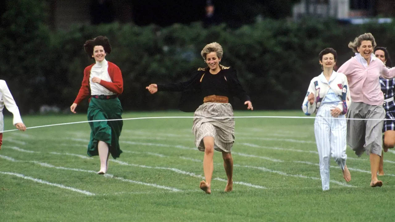 Princess Diana breaks royal protocol for the 1991 Mother's Day event at Wetherby School. | Courtesy: David Hartley/Shutterstock