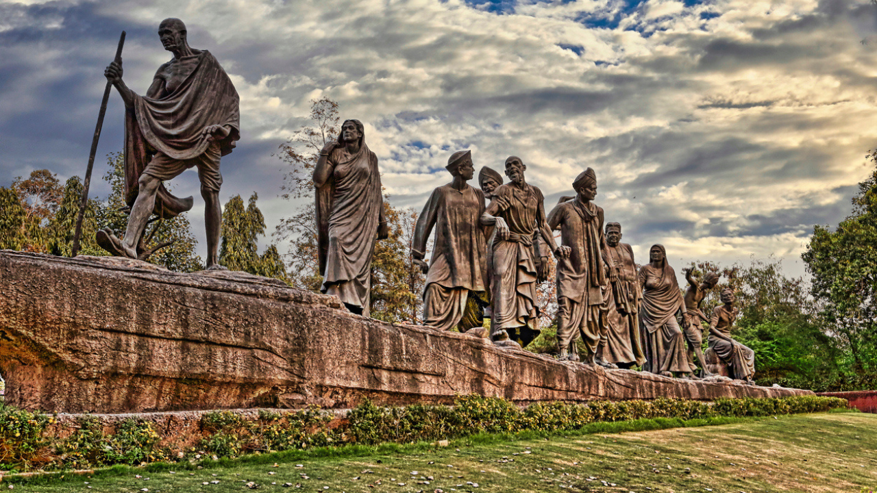 Dandi March by Mahatma Gandhi and his followers; Image - Canva