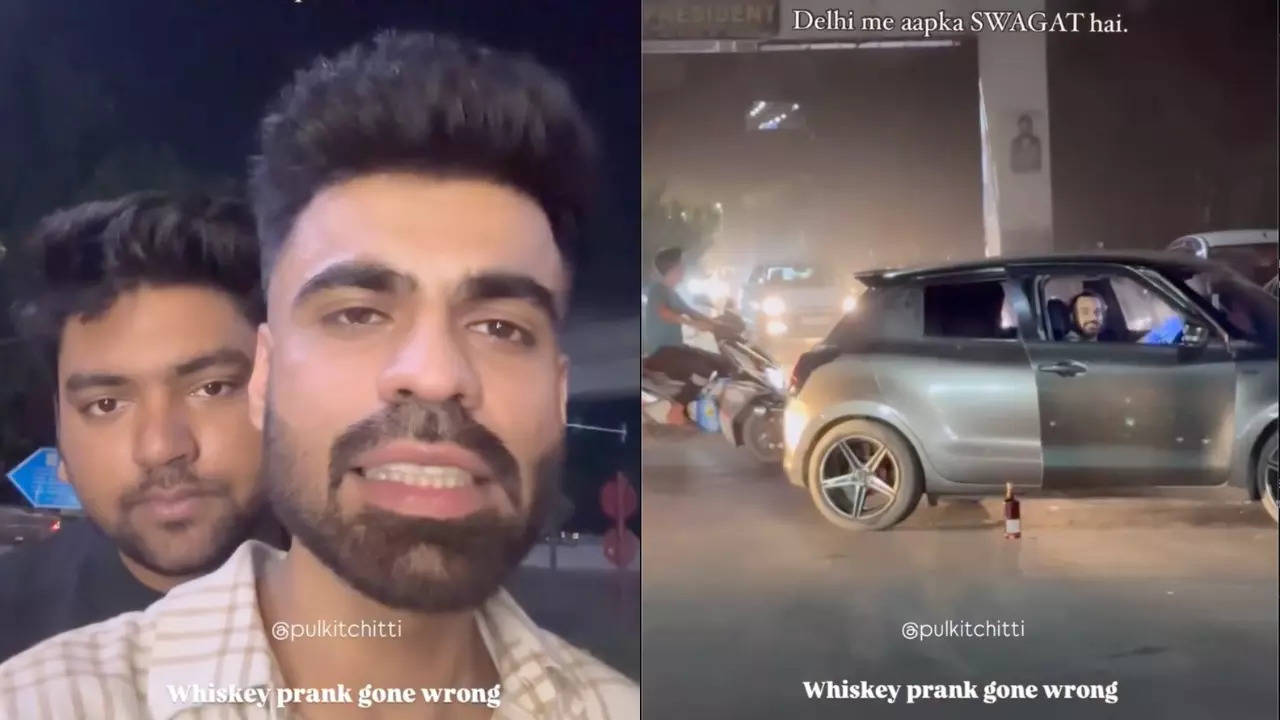 A Swift driver picks up a bottle of whiskey from the middle of the road. | Credit: Pulikit Chitkara