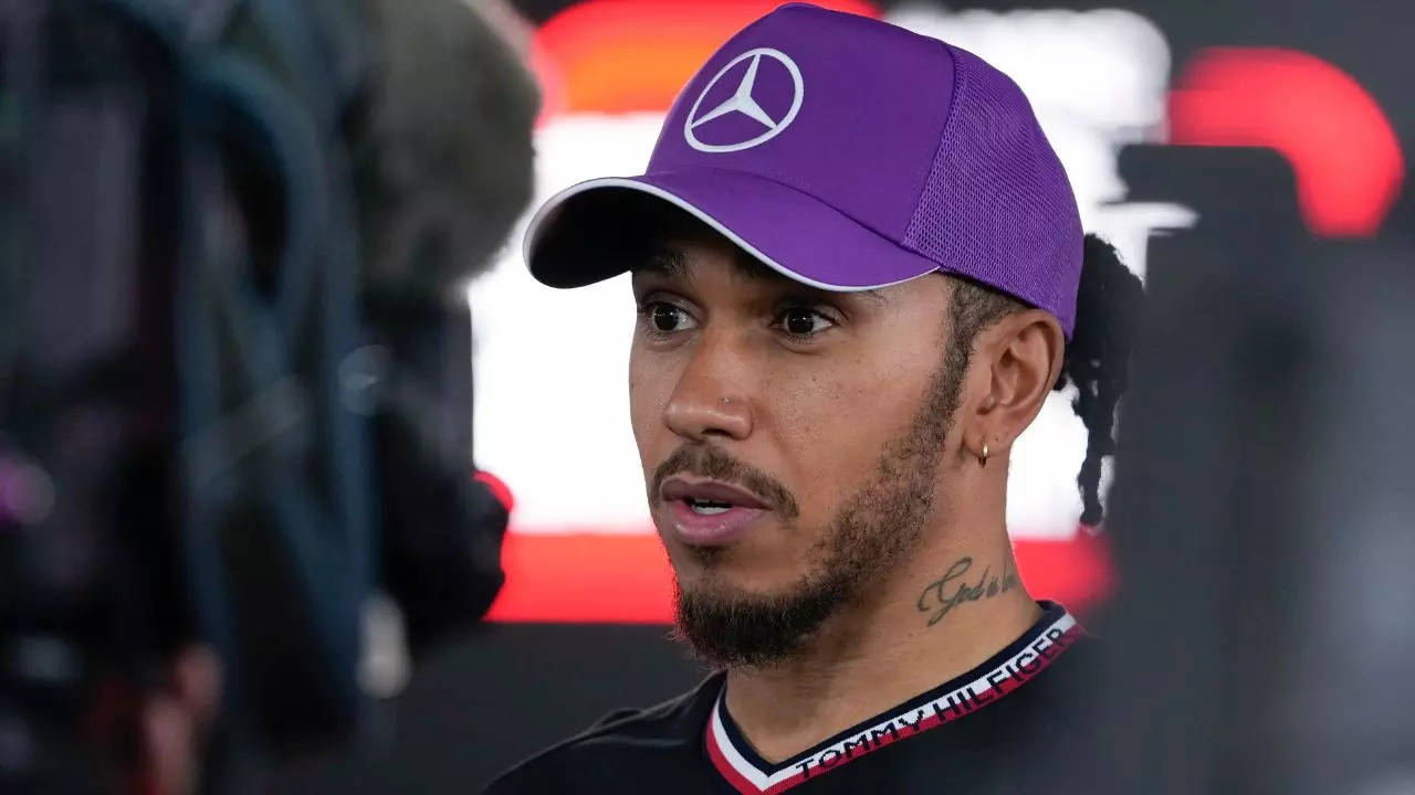 Lewis Hamilton addresses media after the qualifying session at the Suzuka Circuit.