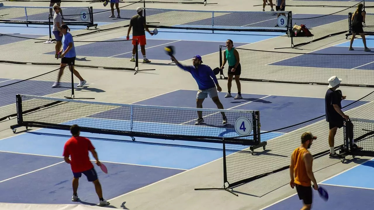 A game of pickleball underway on the court.