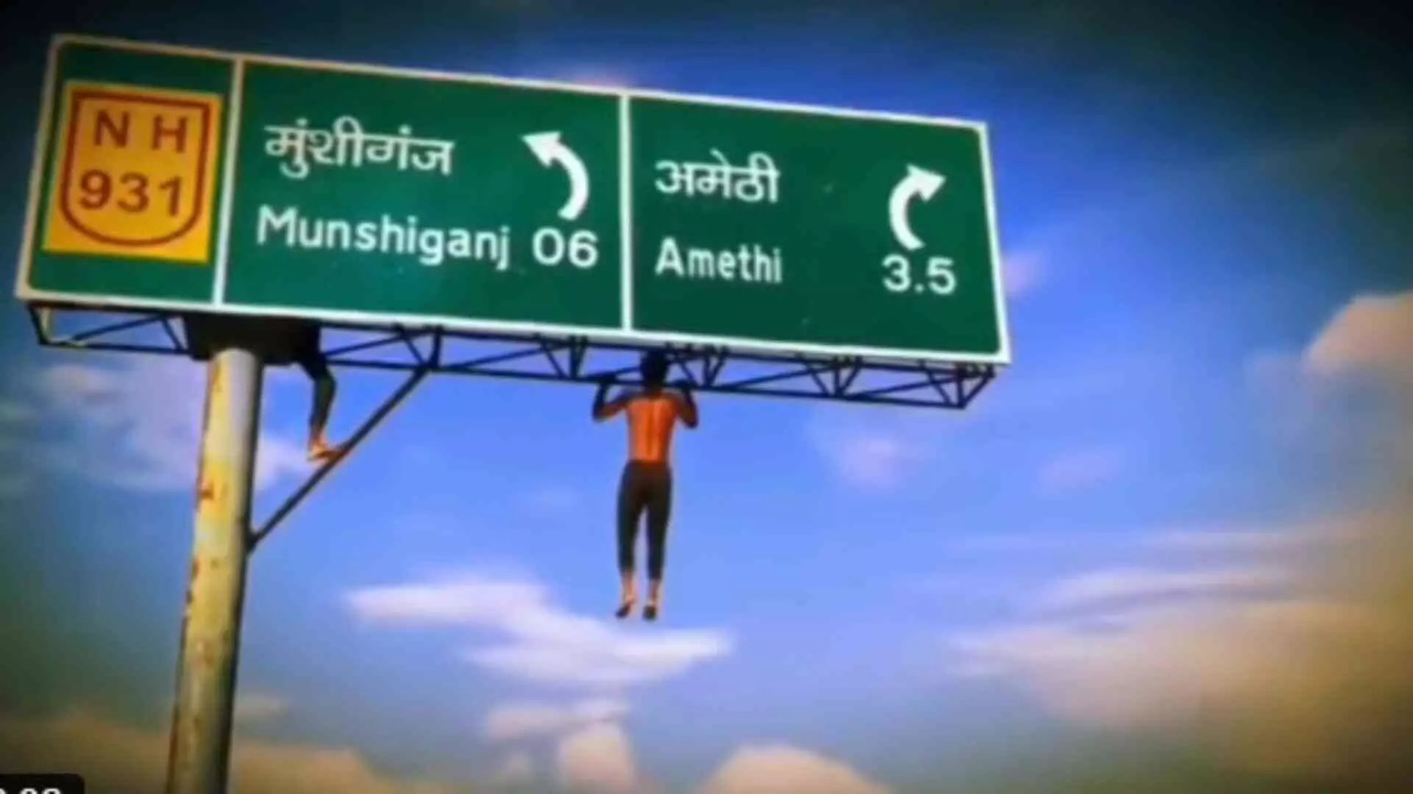 UP Man Does Pull-Ups Holding Highway Signboard