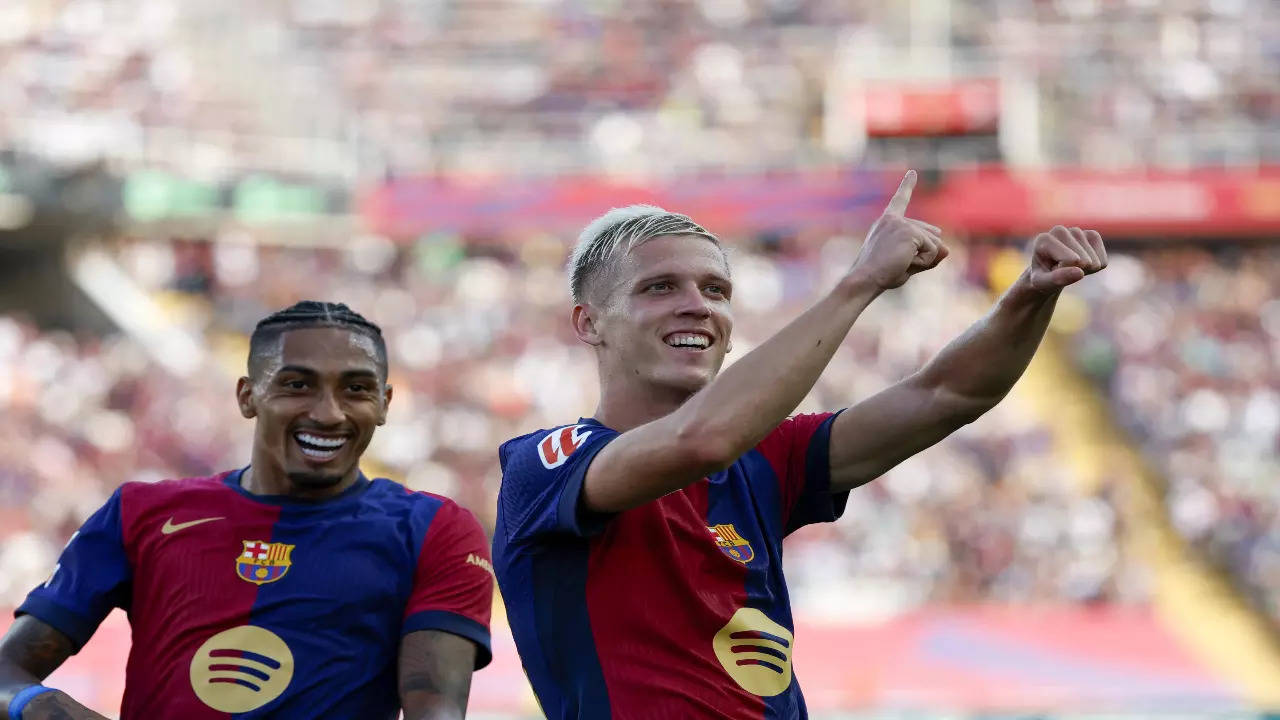 Dani Olmo and Raphinha celebrate Barcelona's goal