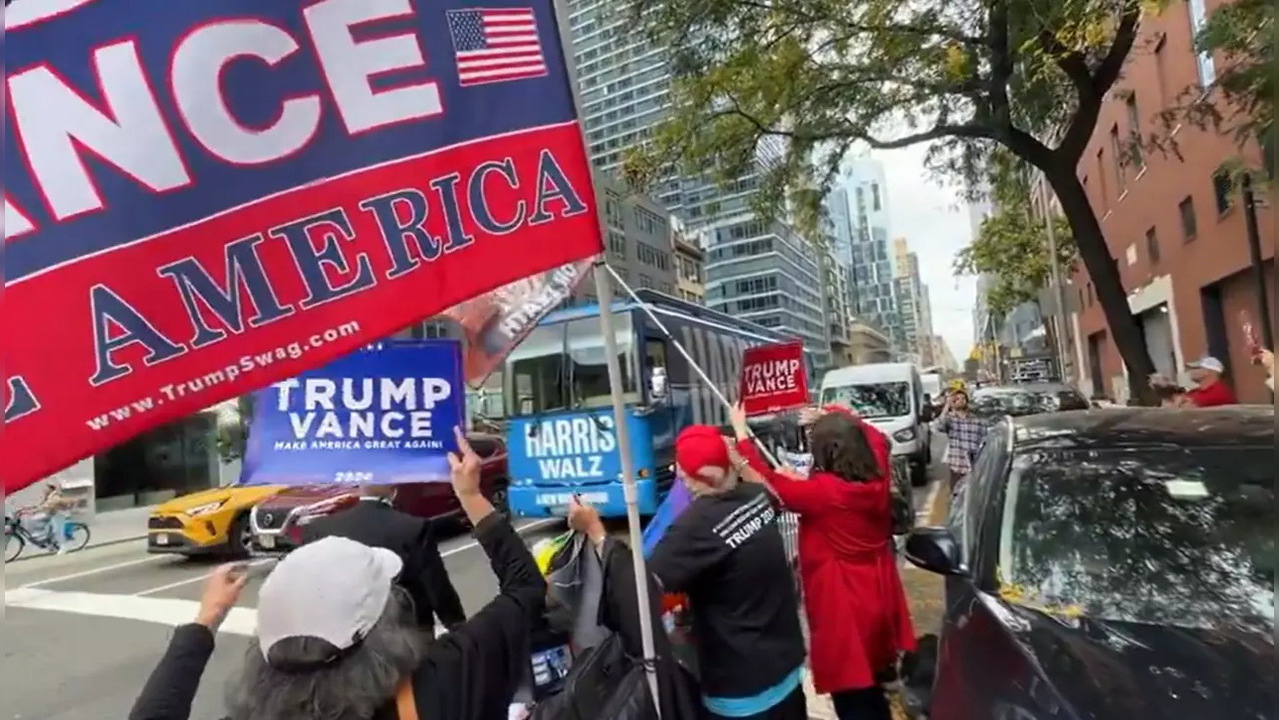 Harris-Walz Bus Greeted By Trump Supporters