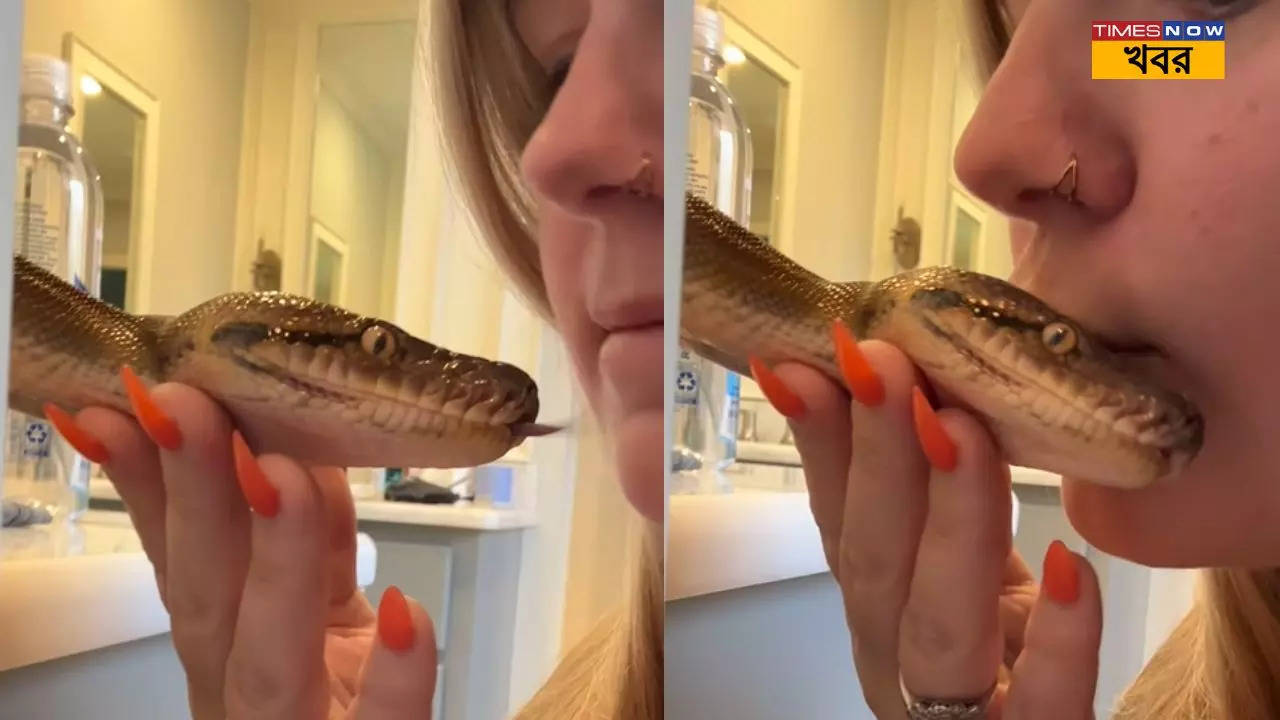 Viral Video shows woman kissing python netizens reaction goes viral