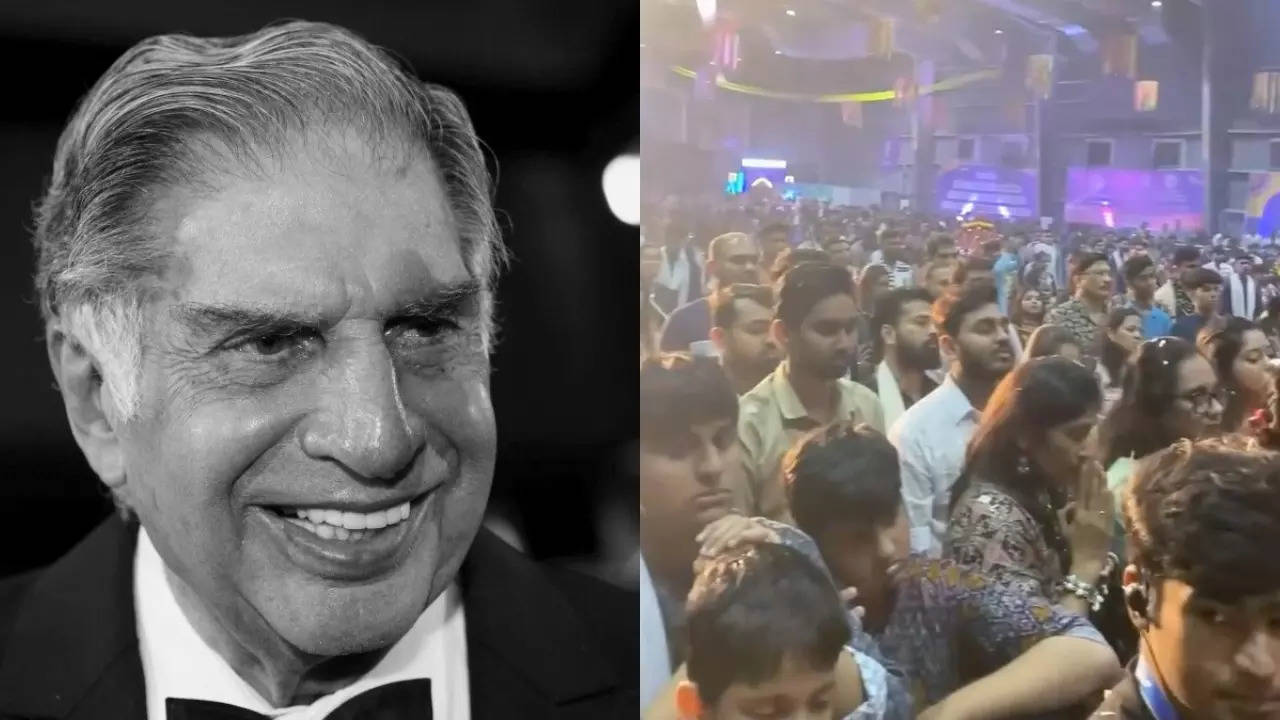 A Garba event in Mumbai pauses for a moment of silence for the late Ratan Tata. | Credit: Reuters