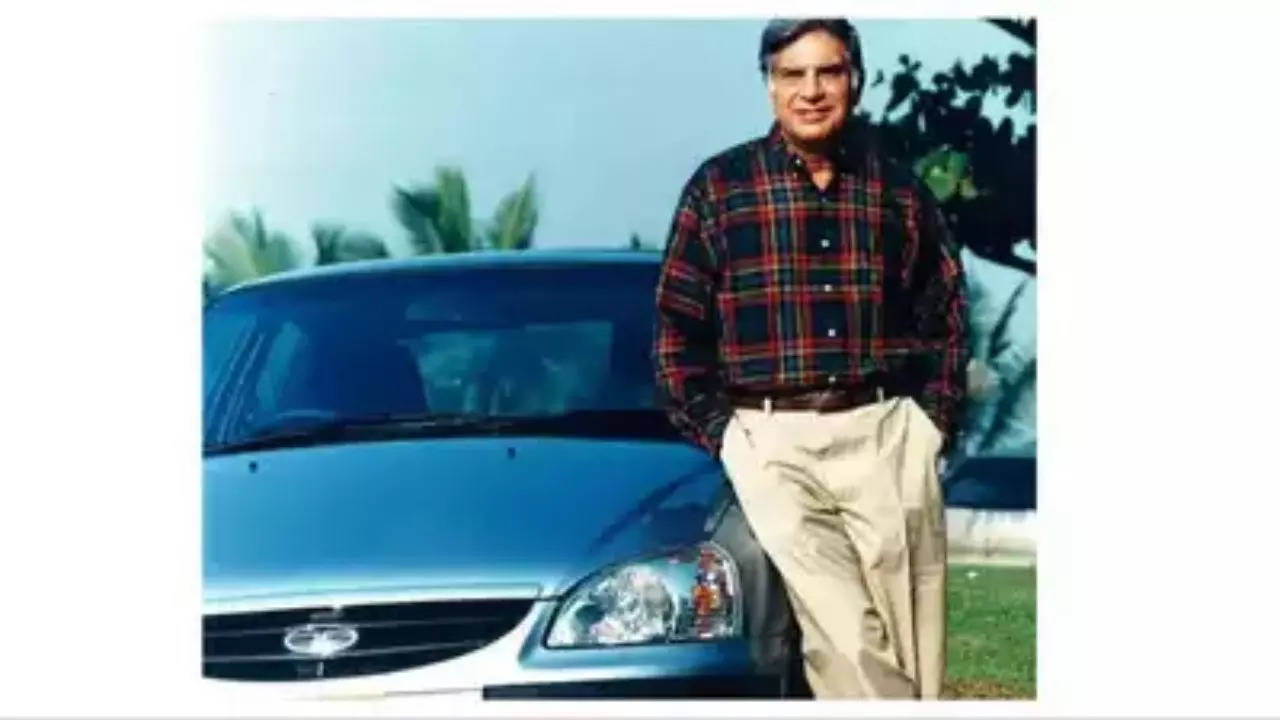 Ratan Tata next to Tata Indica car