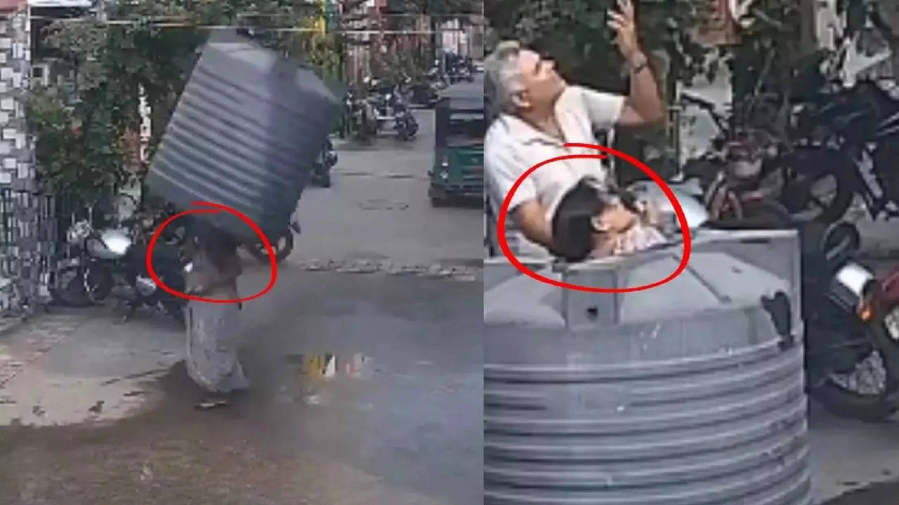 woman narrowly escapes death after water tank falls from above viral video