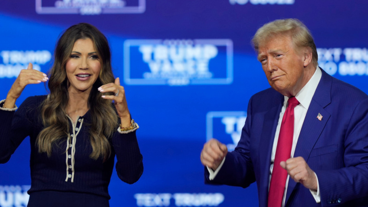 Donald Trump and Kristi Noem at the townhall