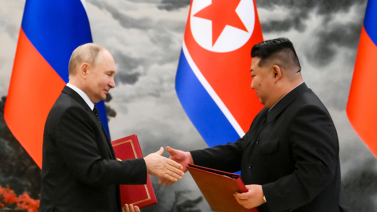 Vladimir Putin and Kim Jong Un