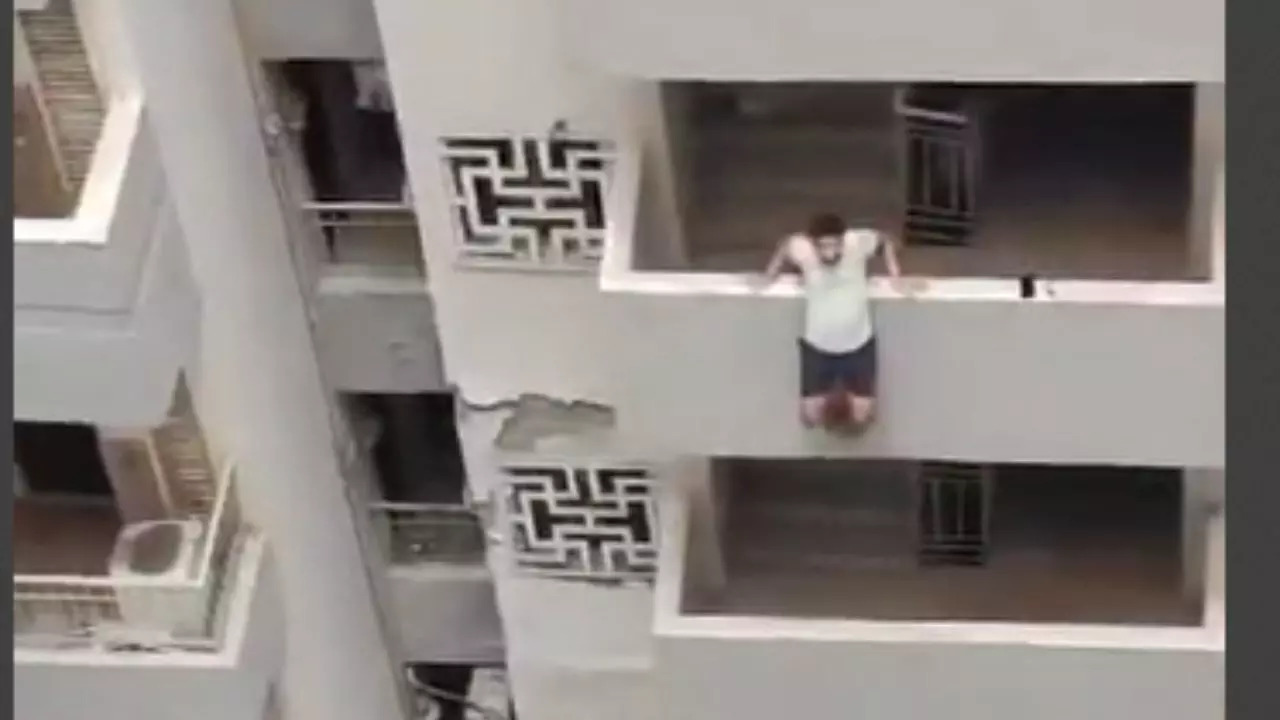 Man Tries To Jump From Building