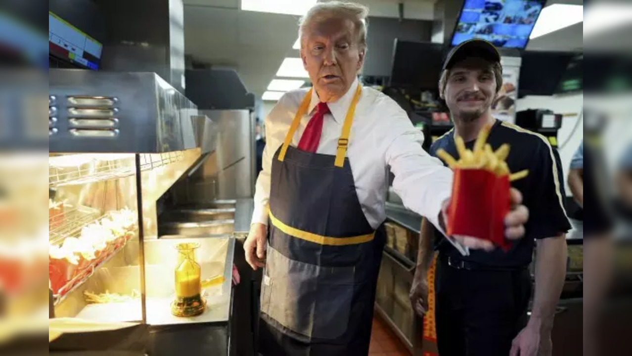 Donald Trump Serves Fries To Customers At McDonald's