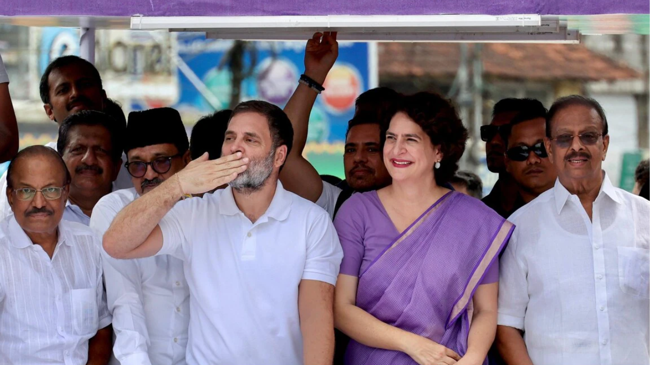 Priyanka Gandhi with Rahul Gandhi during a roadshow in Way