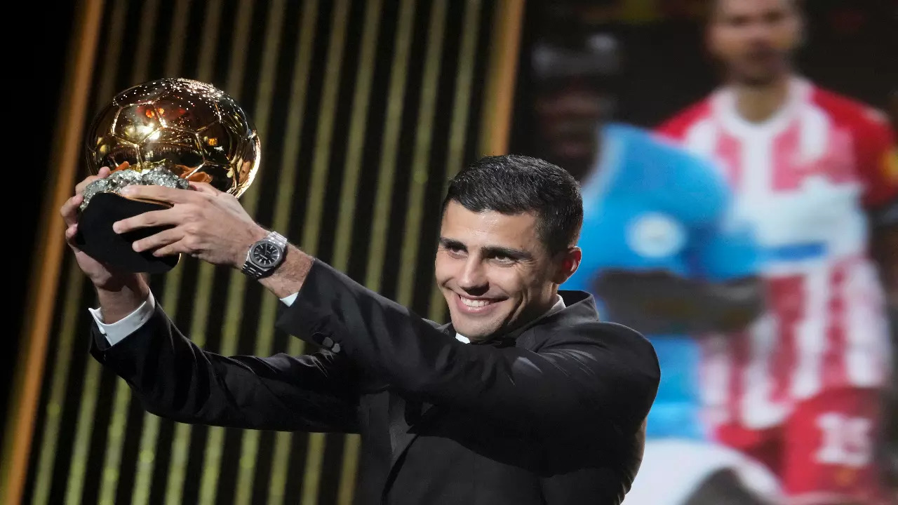 Rodri with the 2024 Ballon d'Or trophy