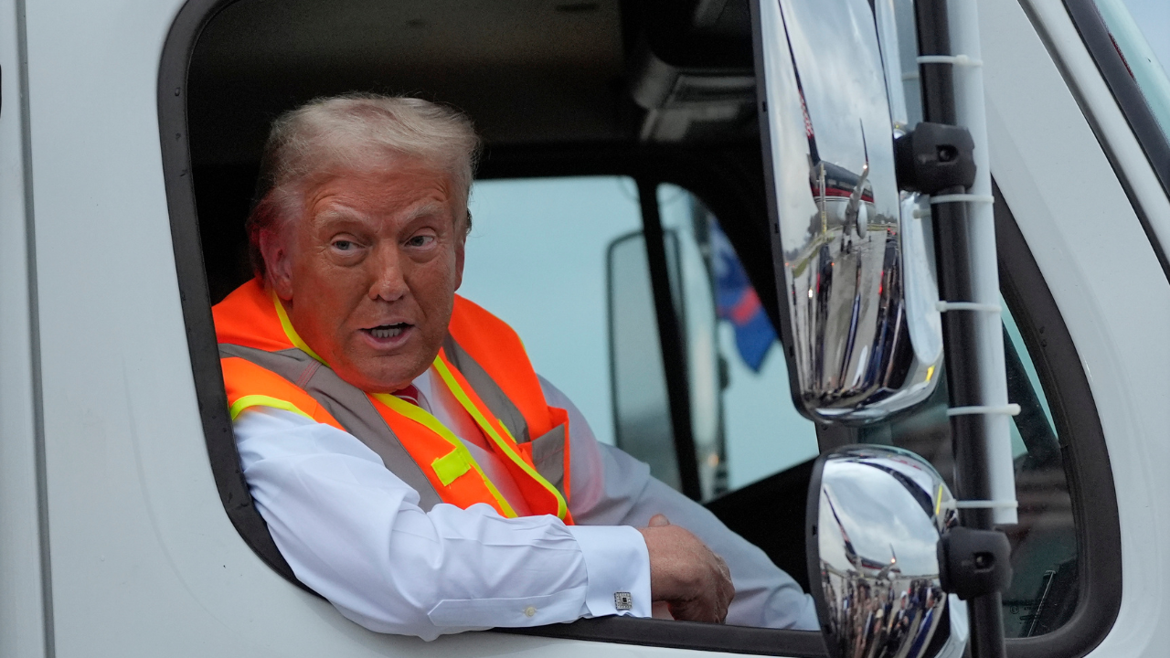 Donald Trump in a garbage truck