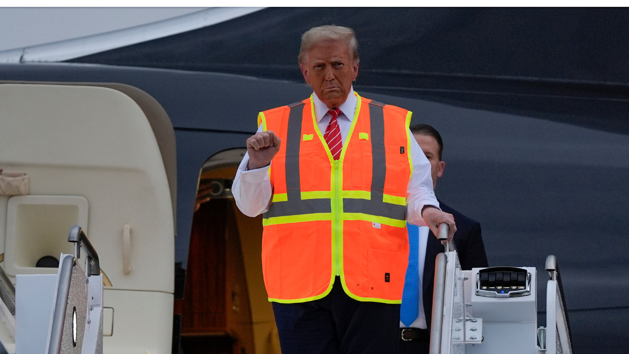 Donald Trump in a garbage man outfit