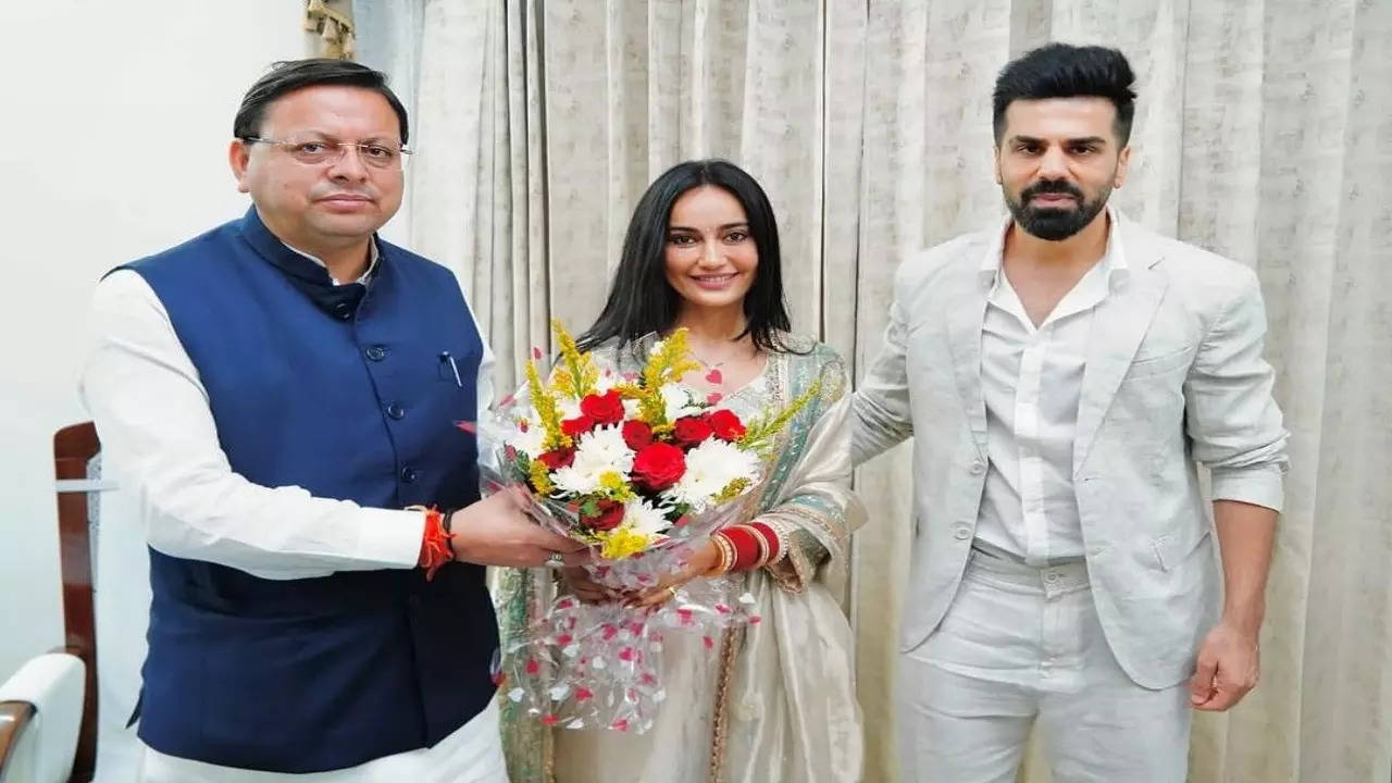 Surbhi Jyoti-Sumit Suri Meet Uttarakhand CM Pushkar Singh Dhami After Wedding